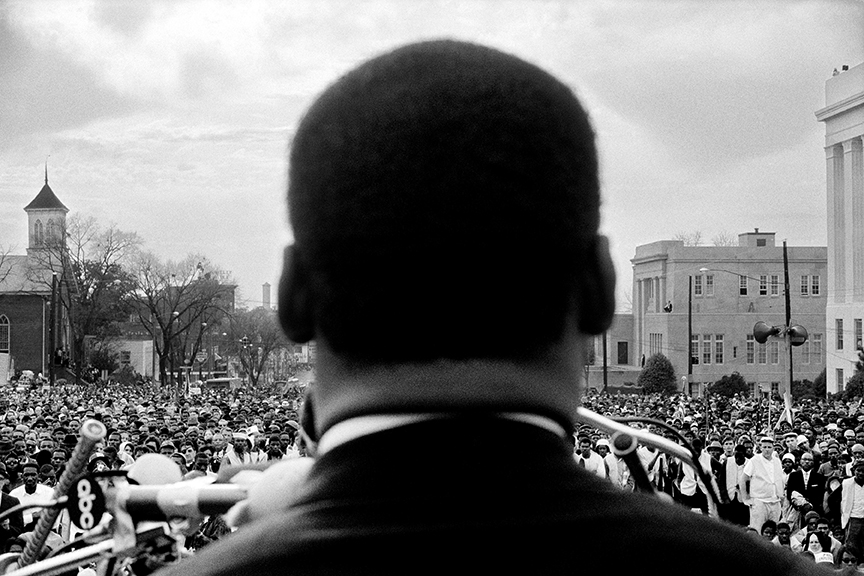 Stephen Somerstein, Dr. Martin Luther King, Jr. Looks out at crowd in Montgomery, 1965. Courtesy of the photographer